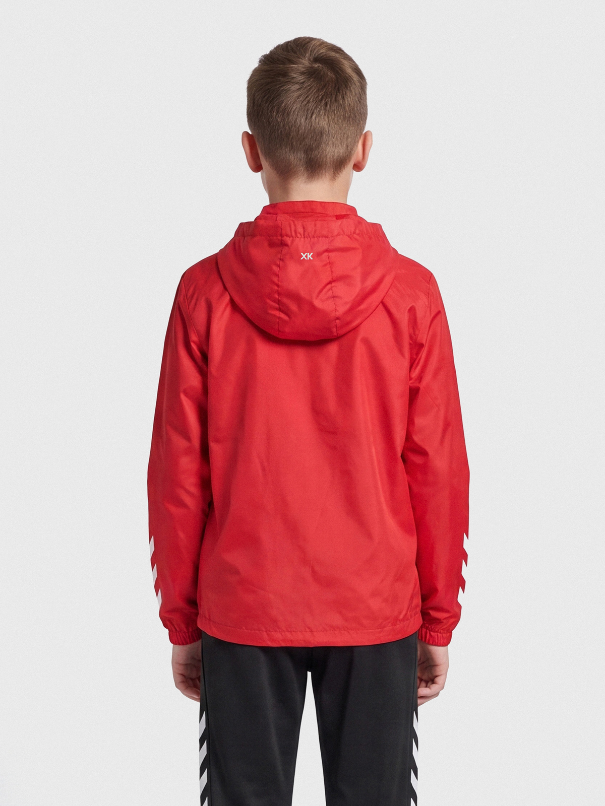 hmlCORE XK SPRAY JACKET KIDS