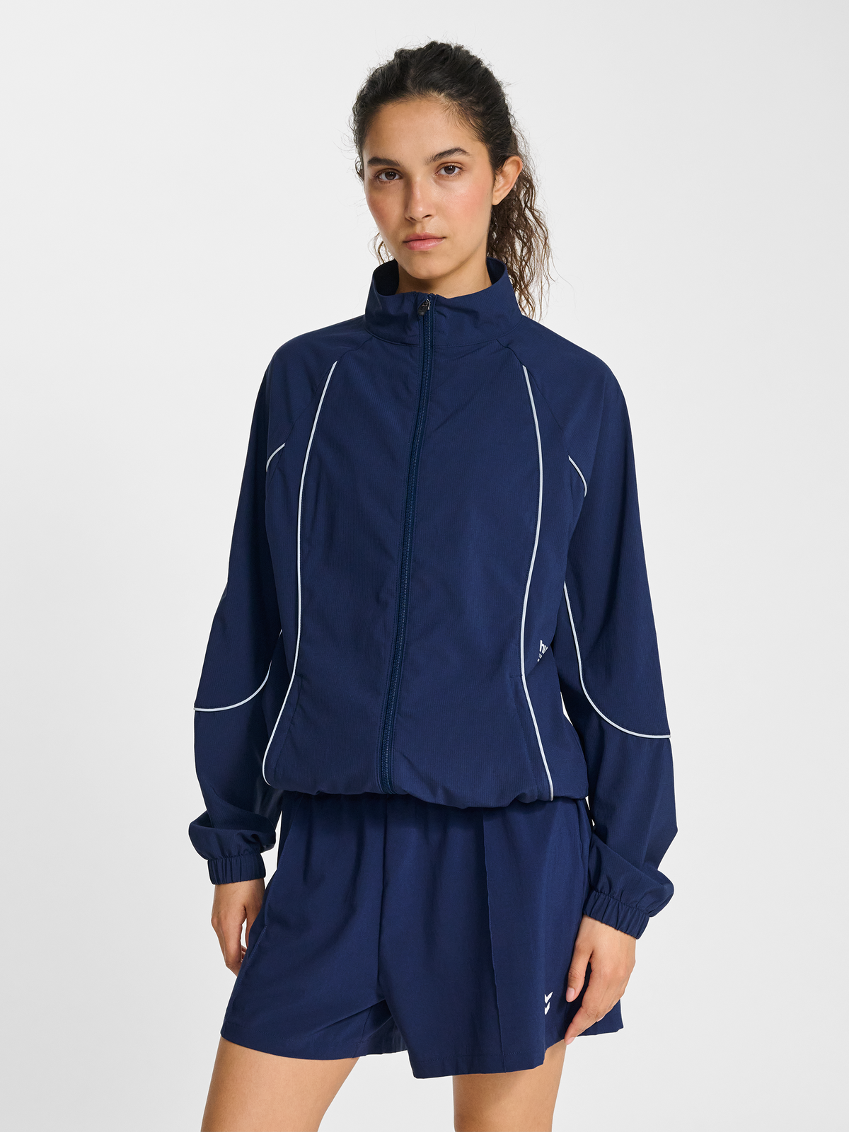 hmlPULSE WOVEN W ZIP THROUGH